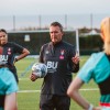 Steve Cuss, AFC Bournemouth women's team manager, talking to players