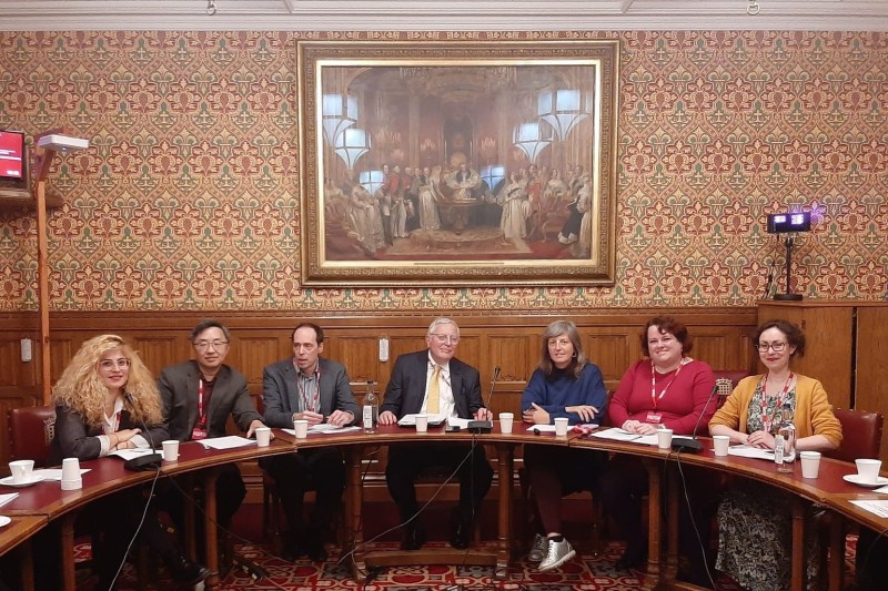 BU researchers sat around a table in the House of Lords