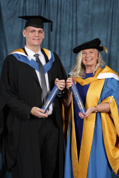 Alison and her Son Conor in graduation robes