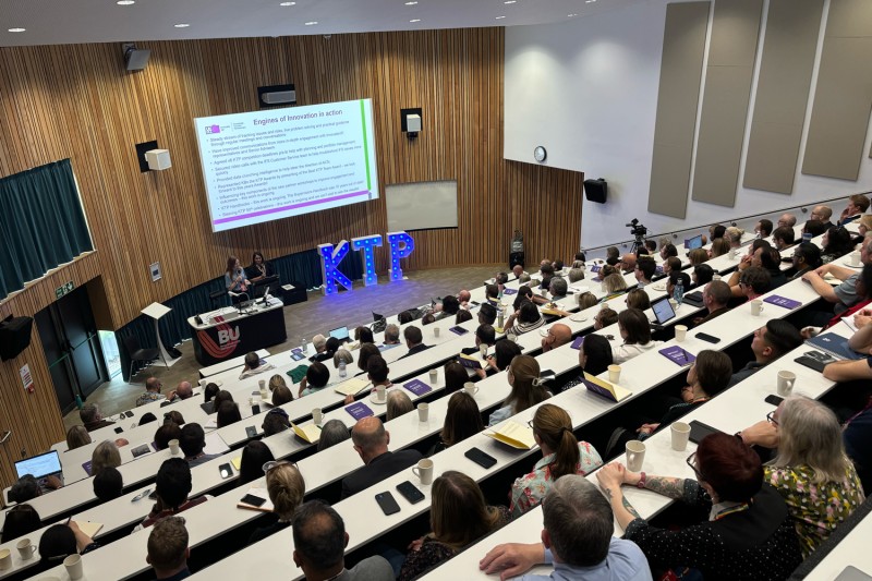 Delegates seated in the Share lecture theatre on Talbot Campus